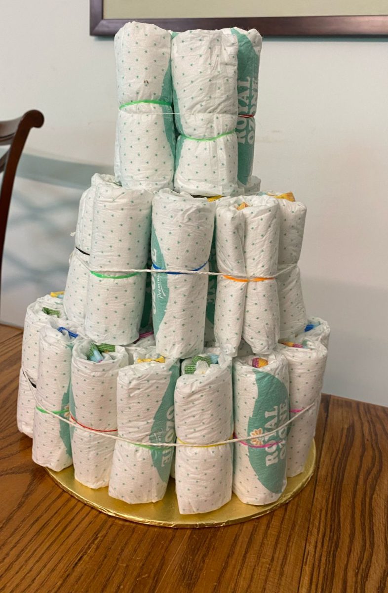 Making the 3rd tier to make the diaper cake