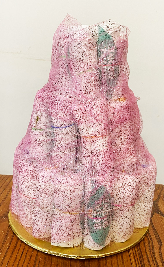 Diaper cake wrapped in glitter net