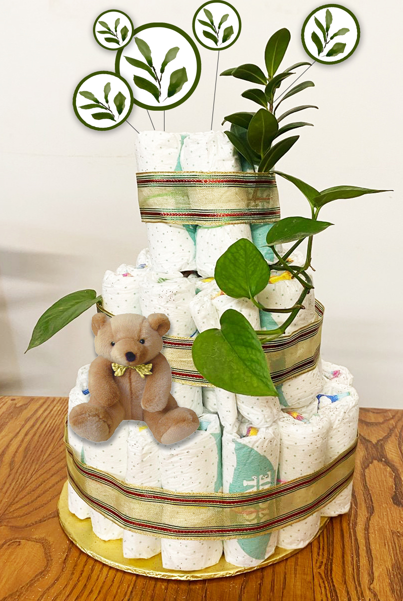 Diaper cake decoration with fresh leaves